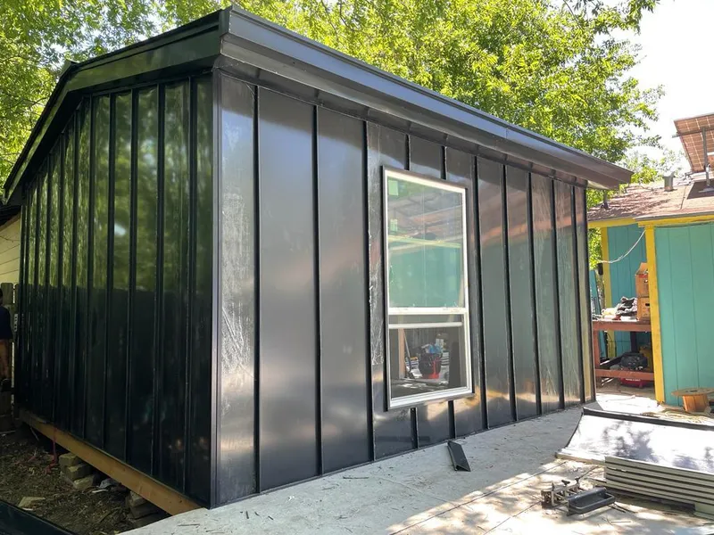 Black standing seam metal wall panels for Metal Roof Installation in Thetford